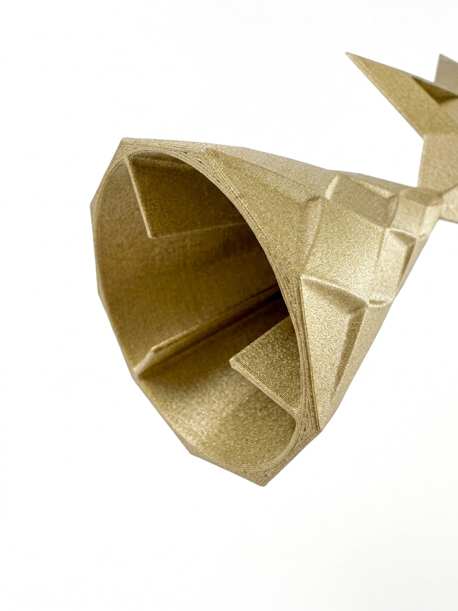 A close-up of internal fins in the based of the Start of David Tree Topper, against a plain white background.